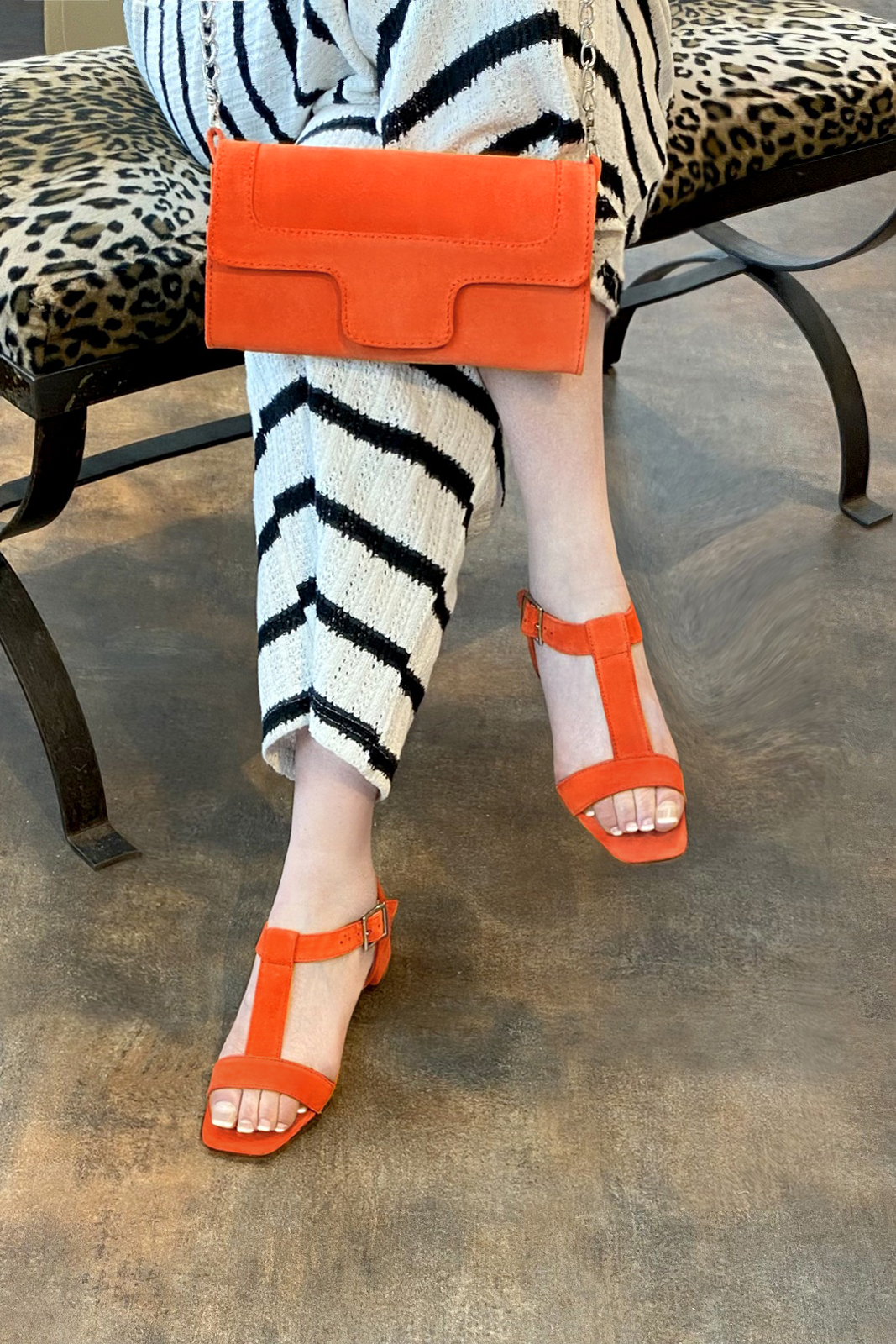 Clementine orange women's fully open sandals, with an instep strap. Square toe. Low flare heels. Worn view - Florence KOOIJMAN